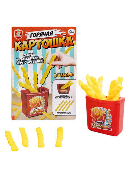 Комплект игры: упаковка, красный стаканчик и жёлтые игровые палочки.
