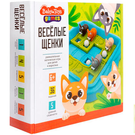 Коробка настольной игры «Весёлые щенки» с игровым полем и щенками на обложке.